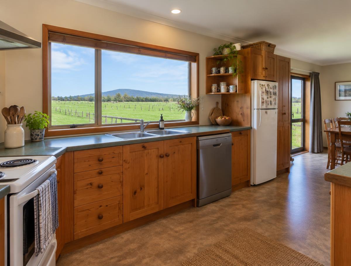 Practical kitchen looking out to the paddocks